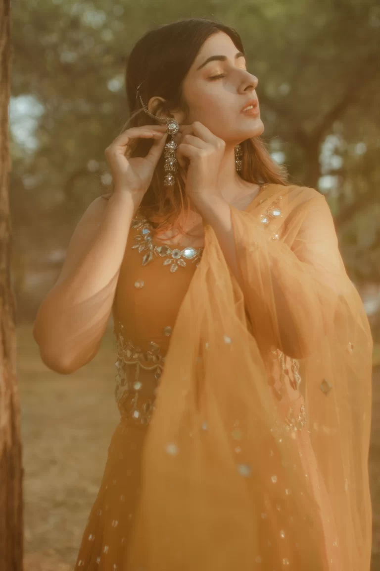 Elegant wedding wear featuring a beautifully crafted bridal outfit with intricate embroidery and timeless design for a stunning wedding day look.